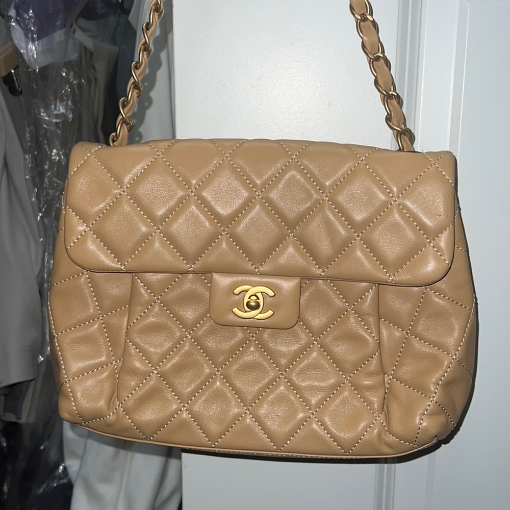 Used once Chanel handbag in tan.  Excellent condition. Low ball offers ignored